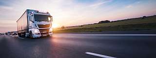 truck on road sunset