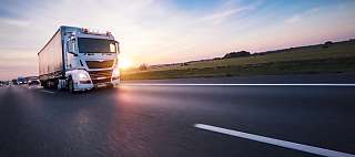 truck on road sunset