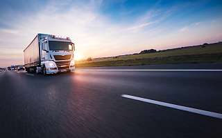 truck on road sunset