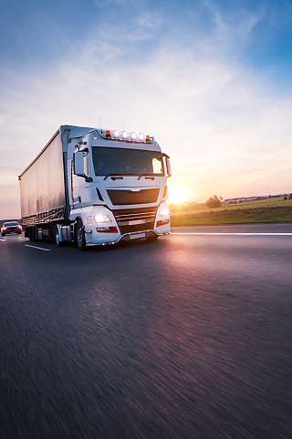 truck on road sunset