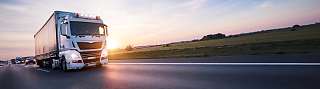 truck on road sunset
