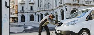 ev van charging plugging 01
