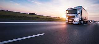 truck on road sunset
