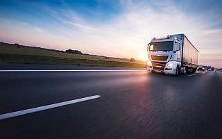 truck on road sunset