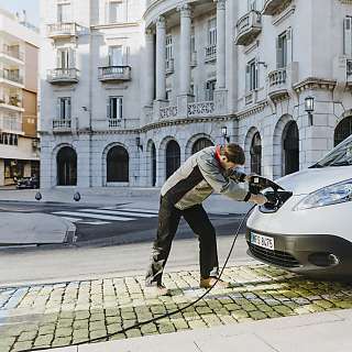 ev van charging plugging 01