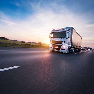 truck on road sunset