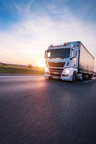 truck on road sunset