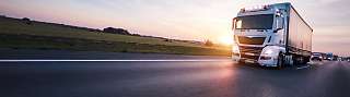 truck on road sunset