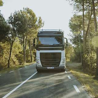 truck on the road front view