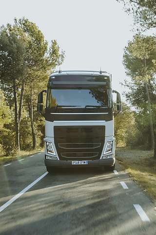 truck on the road front view