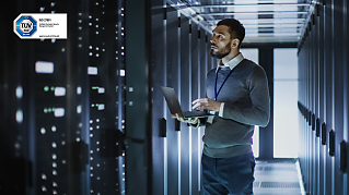 An employee at work at a data centre