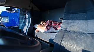 truck sleeping person