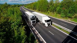 trucks overtacking on highway