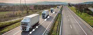 trucks on road with dots