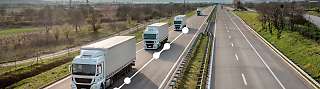trucks on road with dots