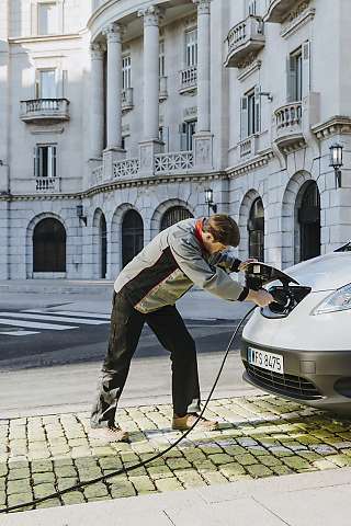 ev van charging plugging 1